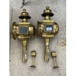 A PAIR OF DECORATIVE BRASS COACH LAMPS