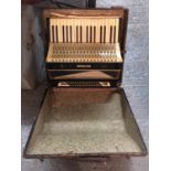 A CASED VINTAGE GRANSIOSA ACCORDIAN