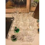 A VARIETY OF DRINKING GLASSES TO INCLUDE TUMBLERS AND STEMMED GLASSES