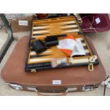 A REVALATION BRIEFCASE AND A BACKGAMMON SET