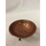 A SMALL ARTS AND CRAFTS COPPER BOWL WITH BRASS PLAQUE