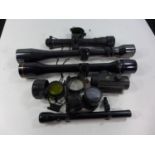 FOUR ASSORTED TELESCOPIC SIGHTS COMPRISING AGS 2X20 PISTOL, MICRO TRAC WEAVER V9-11 W, NCSTAR, ASI
