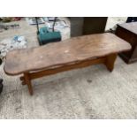 A RUSTIC ELM COFFEE TABLE, 59 X 20"