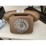 A RETRO LIGHT BROWN DIAL TELEPHONE