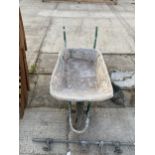 A METAL BUILDERS WHEEL BARROW