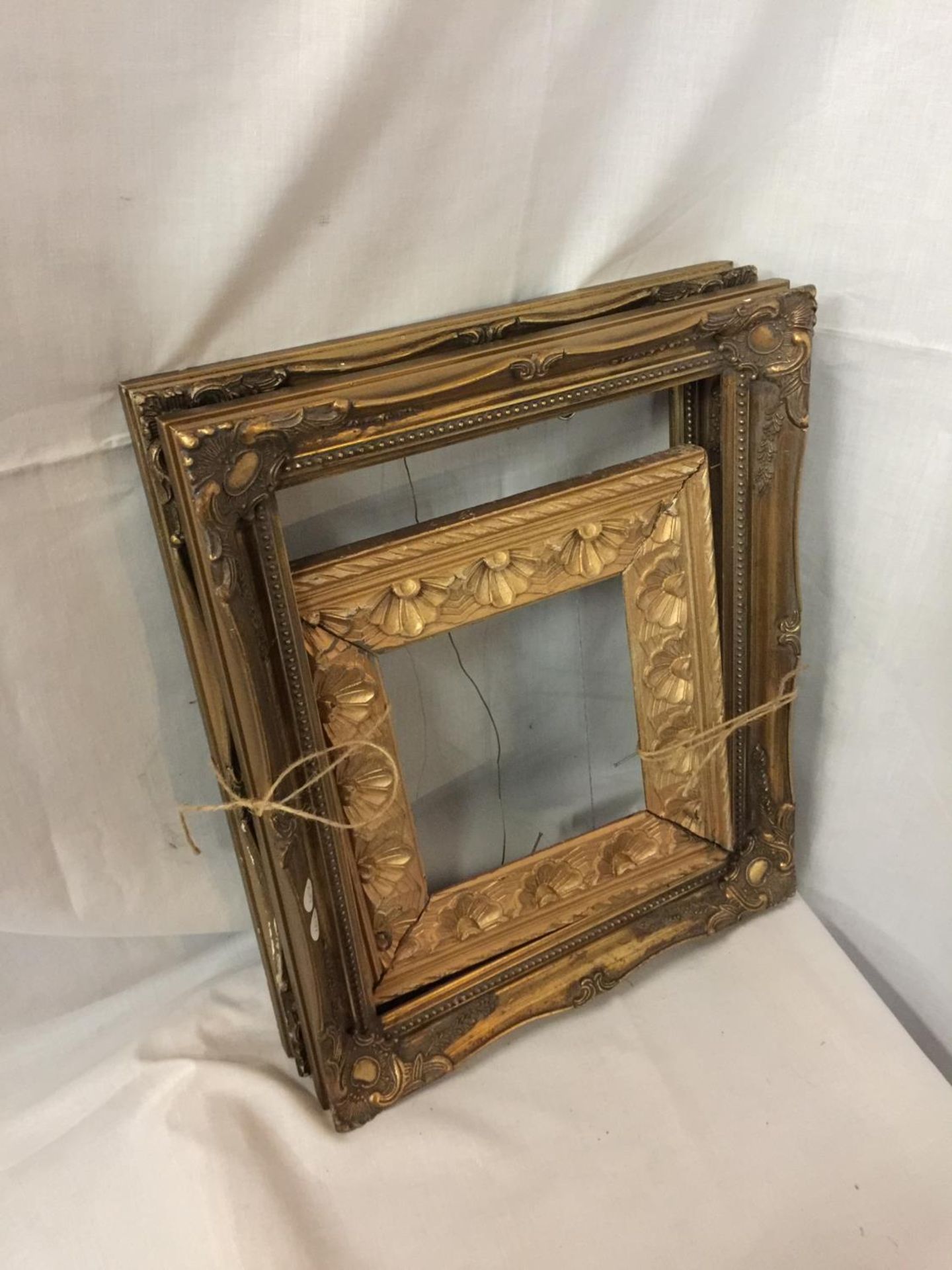THREE GILT PICTURE FRAMES