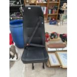 A BLACK LEATHER EFFECT MINIBUS/VAN SEAT WITH SEATBELT