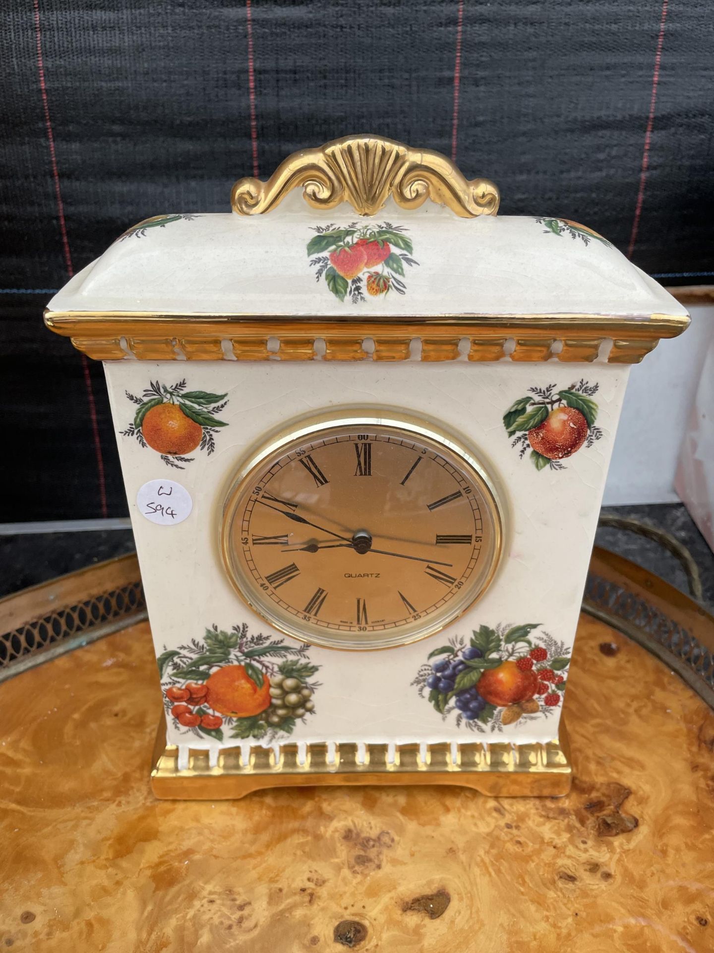 A LARGE BRASS SERVING TRAY AND TWO MANTLE CLOCKS - Image 2 of 3