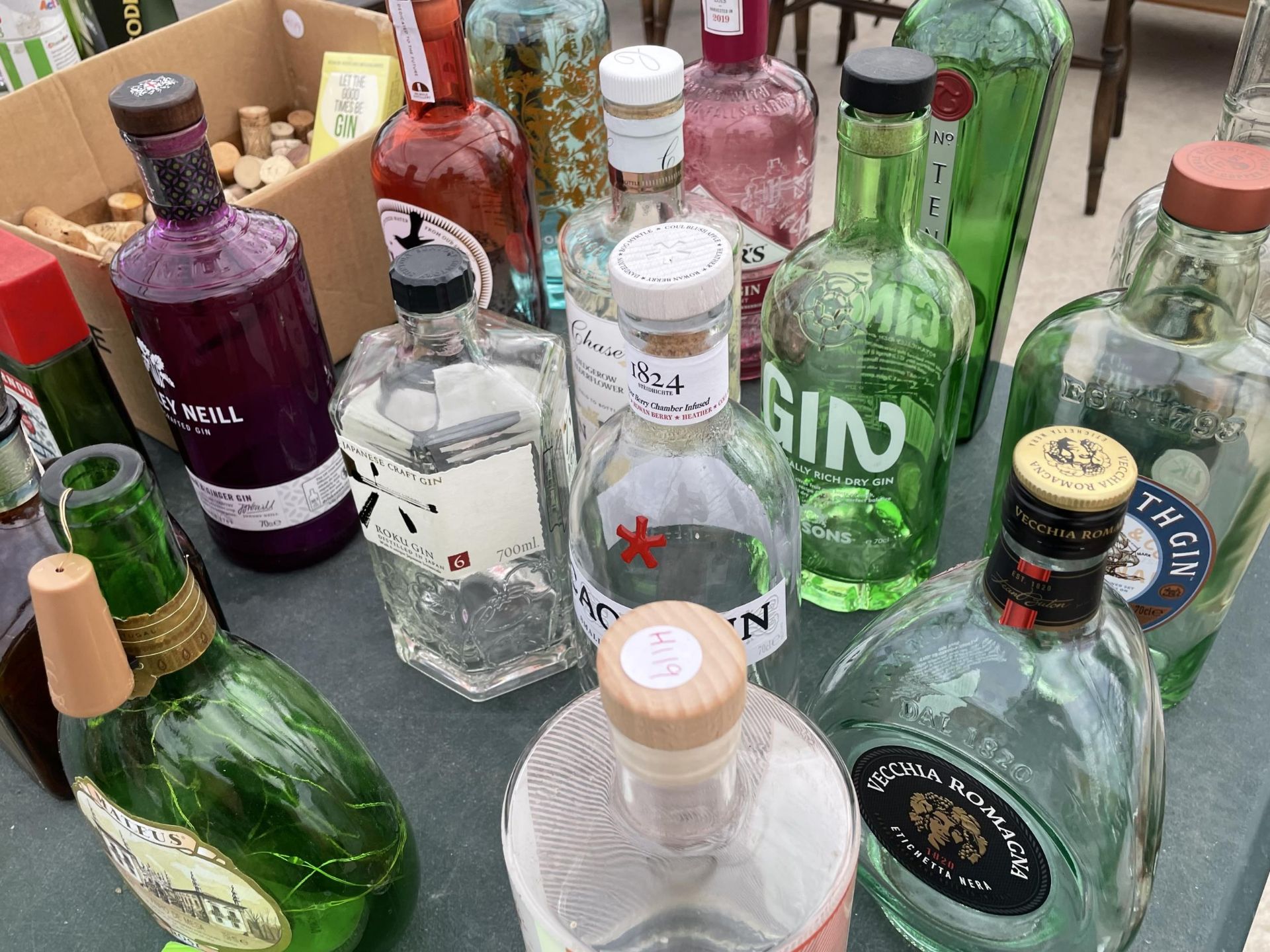 A LARGE ASSORTMENT OF EMPTY GIN BOTTLES, VINTAGE MATEUS ROSE BOTTLES AND VINTAGE WINE CORKS, IDEAL - Image 2 of 3