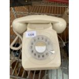 A RETRO 1960'S CREAM ROTARY DIAL TELEPHONE