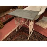 A CAST IRON TABLE WITH MARBLE TOP