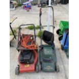 AN ELECTRIC BLACK AND DECKER LAWN MOWER AND A FURTHER PETROL ENGINE LAWN MOWER
