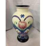 A LARGE TUPTON FLORAL BALUSTER FORM VASE