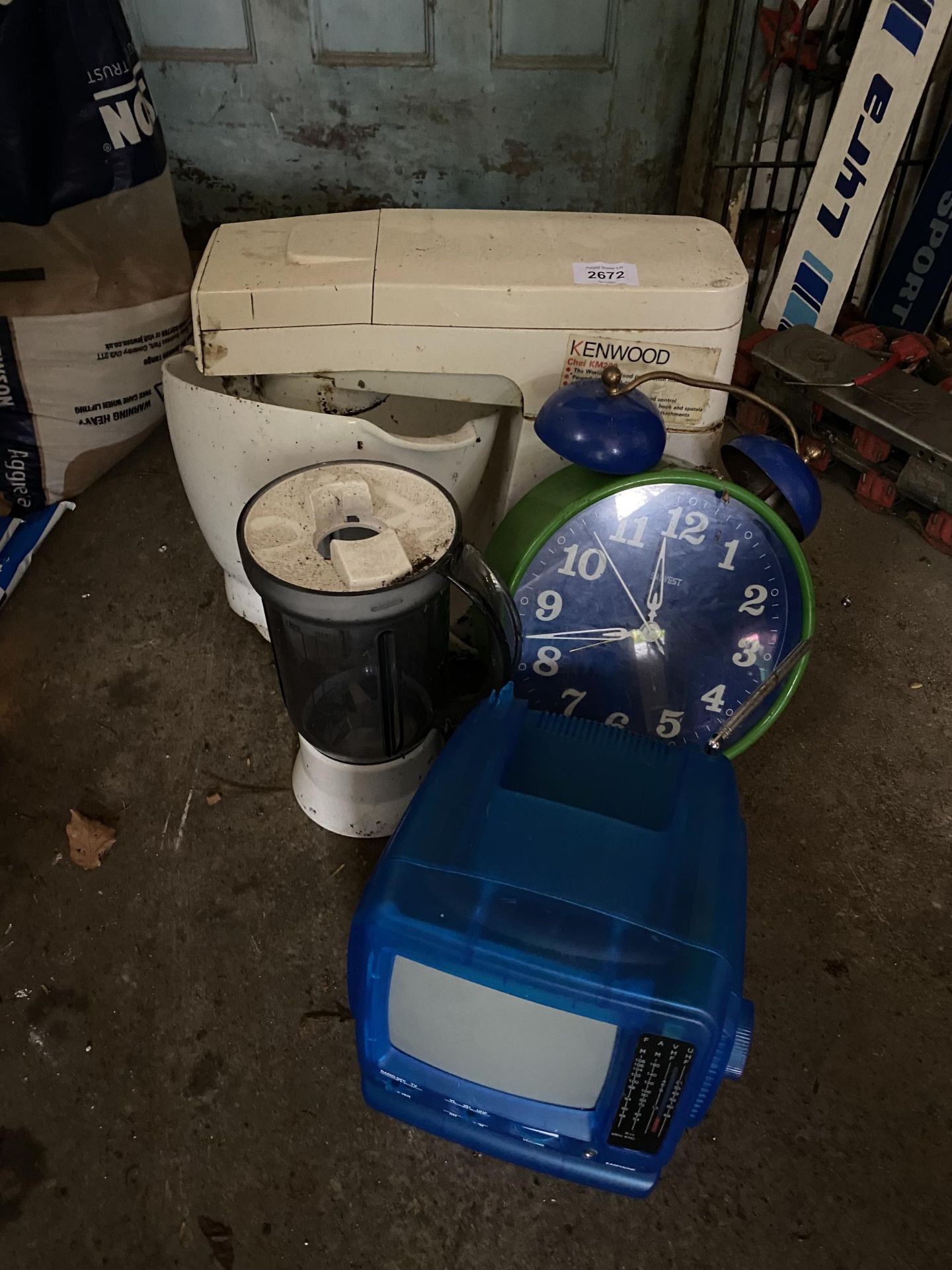 AN ASSORTMENT OF ITEMS TO INCLUDE A KENWOOD CHEF, A PORTABLE TV AND A CLOCK ETC