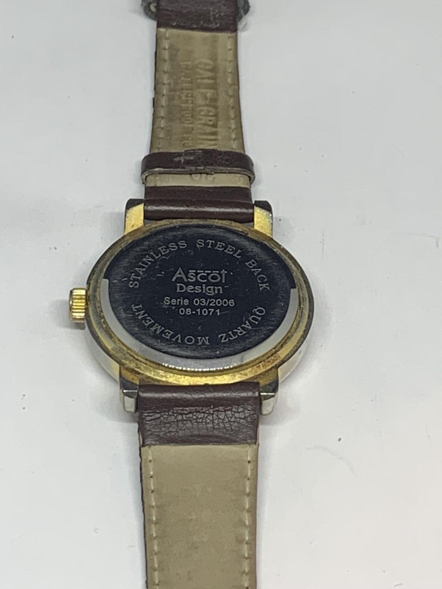 AN ASCOT CALENDAR WRIST WATCH WITH BROWN LEATHER STRAP SEEN WORKING BUT NO WARRANTY - Image 3 of 3