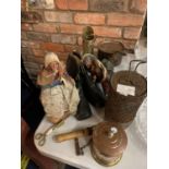 AN AMOUNT OF COLLECTABLES TO INCLUDE TWO FIGURES, A VINTAGE GREENHOUSE HEATER, VINTAGE BOOTS, A