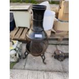 A METAL GARDEN CHIMENEA