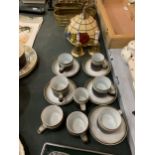 A COLLECTION OF ITEMS TO INCLUDE DENBY CUPS AND SAUCERS, TWO HAND BELLS AND A LAMPSHADE