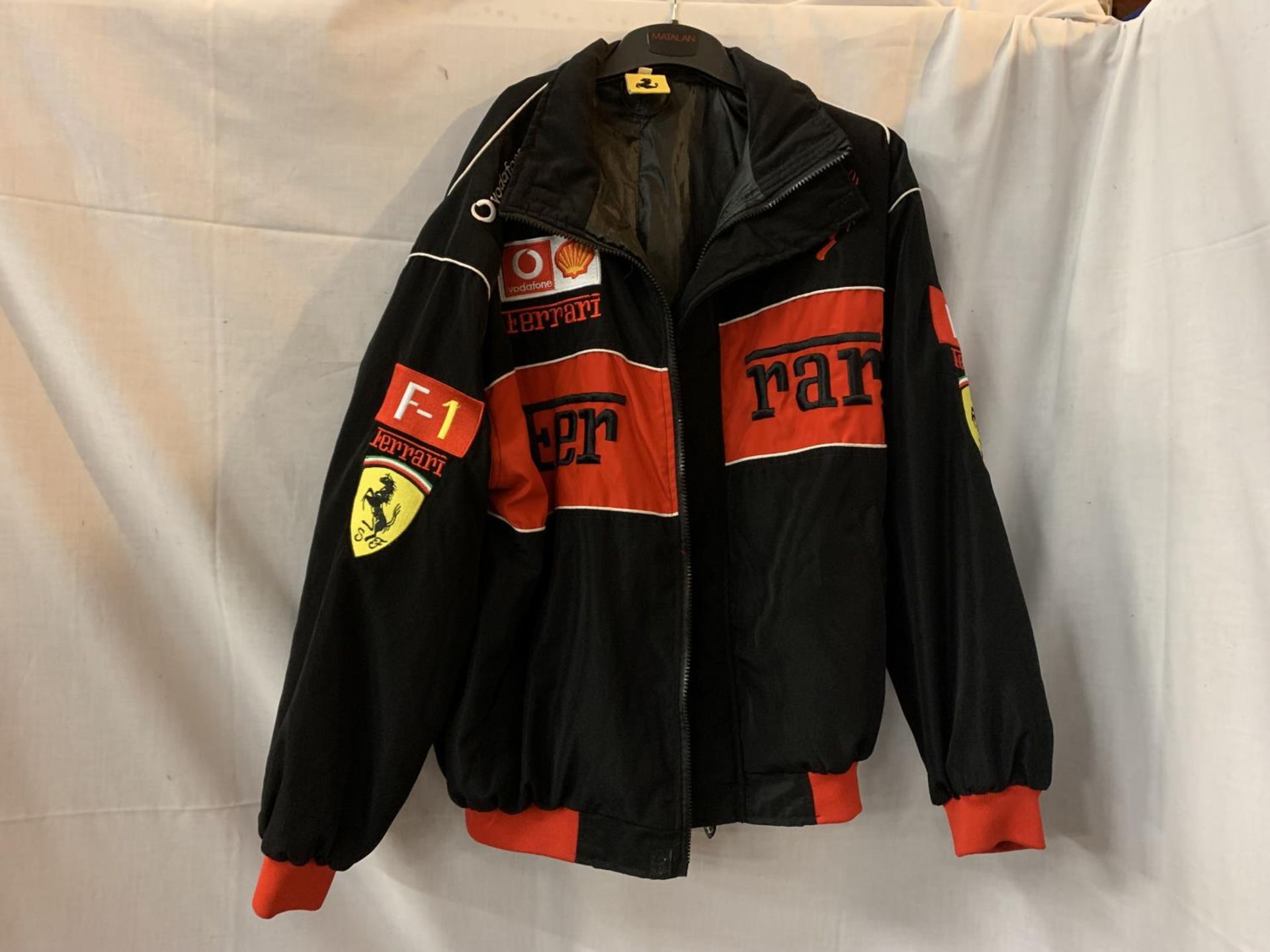 A NEW FERRARI JACKET SIZE L