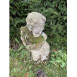 A RECONSTITUTED STONE STATUE OF A CHERUB HOLDING FLOWERS (H:83CM)