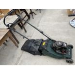 A HAYTER PETROL LAWN MOWER WITH GRASS BOX AND BRIGGS AND STRATTON ENGINE