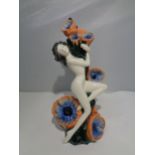 A CARLTON WARE FIGURINE THE CARLTON GIRL