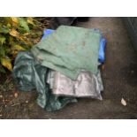 AN ASSORTMENT OF TARPAULIN SHEETS