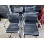 A SET OF FOUR EAMES STYLE POLISHED CHROME OFFICE CHAIRS