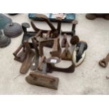 AN ASSORTMENT OF VINTAGE COBBLERS LASTS AND FLAT IRONS ETC