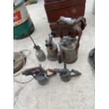 AN ASSORTMENT OF VINTAGE BLOW LAMPS AND AN OIL CAN