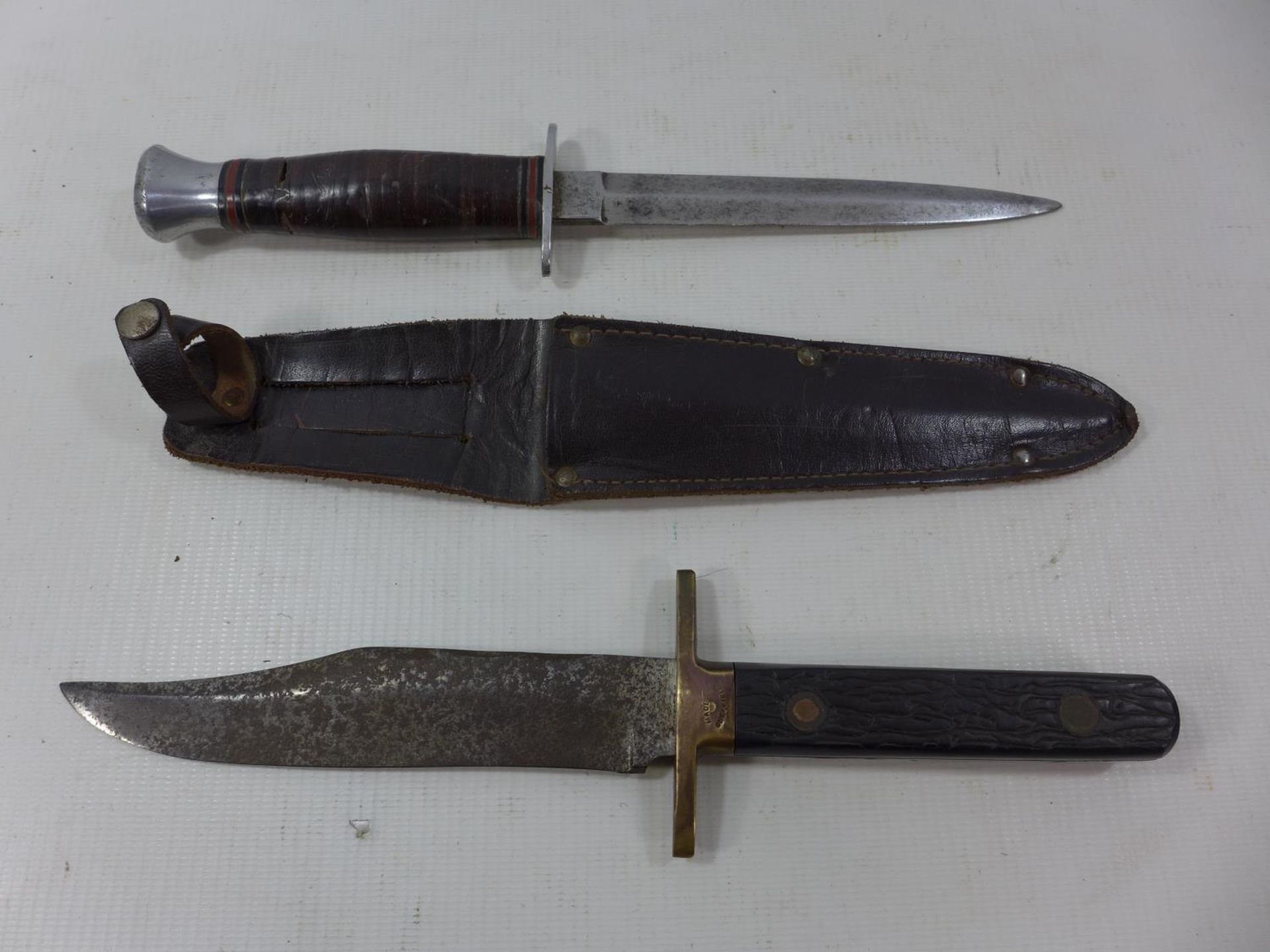 A SHEFFIELD MADE IXL BOWIE KNIFE, 15CM BLADE AND ANOTHER KNIFE, 15CM BLADE, LEATHER SCABBARD