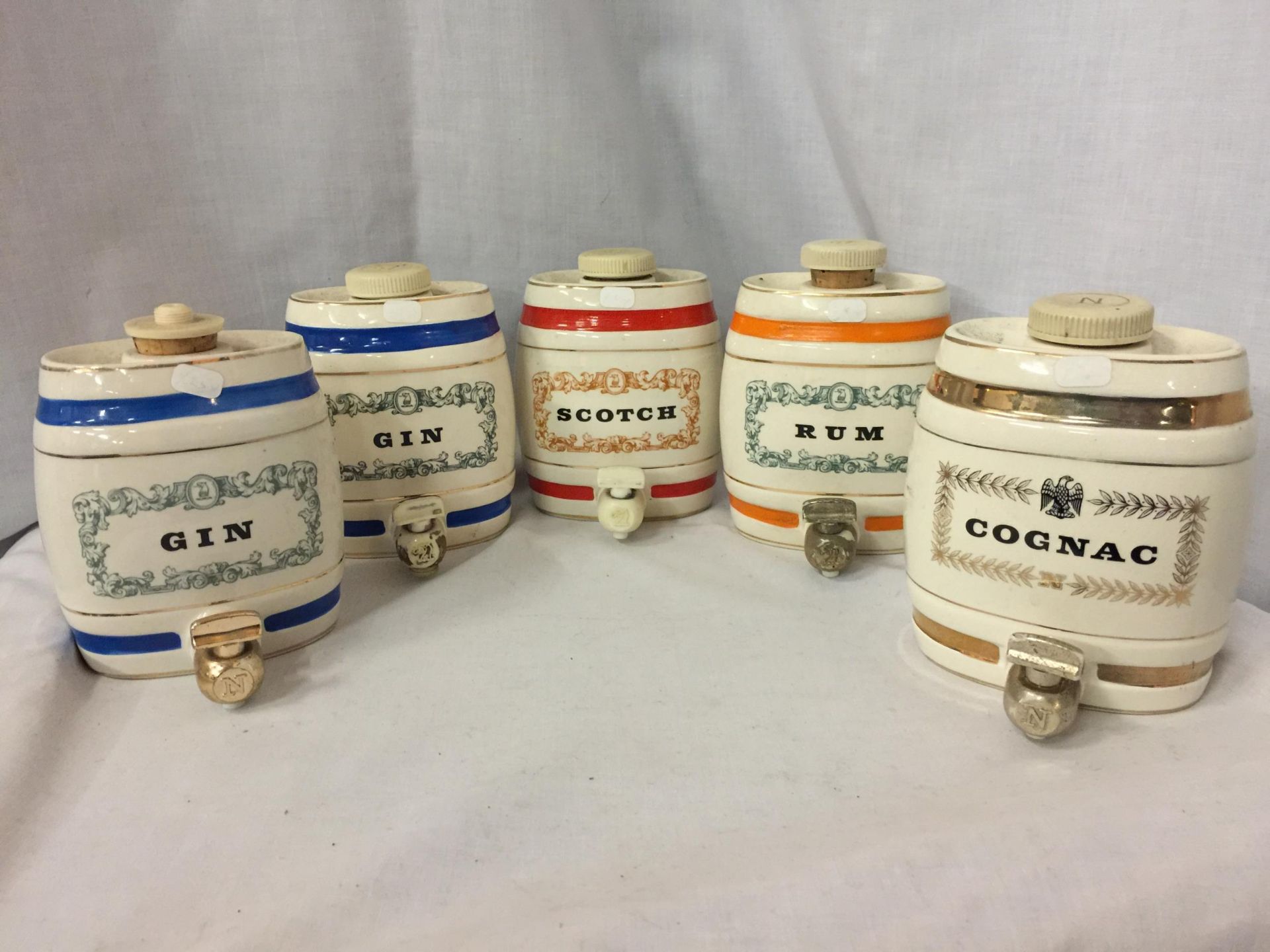 FIVE WADE CERAMIC BARRELS TO INCLUDE GIN, RUM, SCOTCH AND COGNAC 12CM HIGH