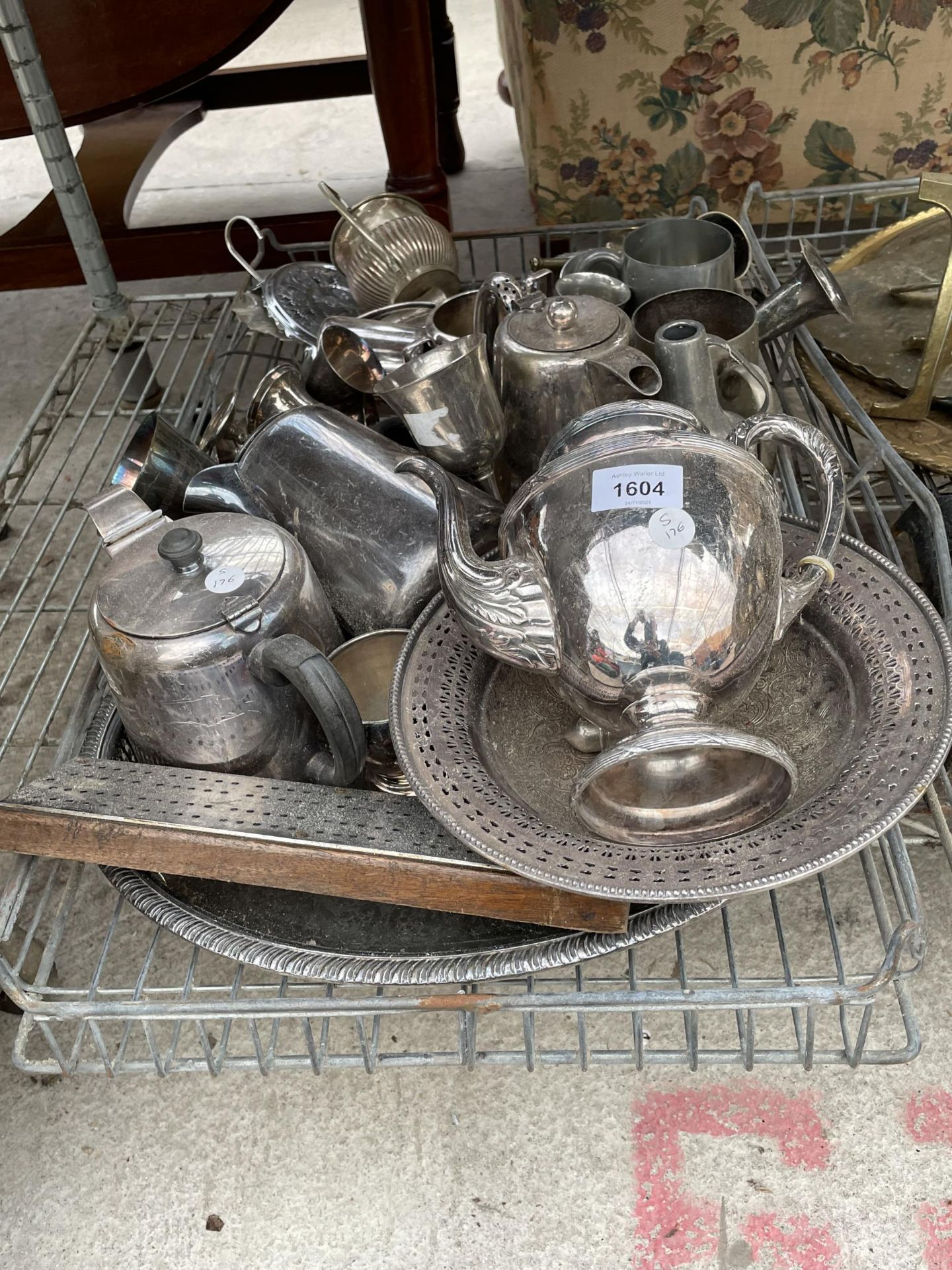 AN ASSORTMENT OF SILVER PLATE ITEMS TO INCLUDE TEAPOTS, CANDLESTICKS AND GOBLETS ETC