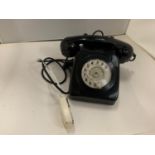 A BLACK VINTAGE DIAL TELEPHONE