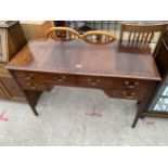 A MAHOGANY AND CROSSBANDED BRADLEY KNEEHOLE DESK WITH FOUR DRAWERS, 48 X 21"