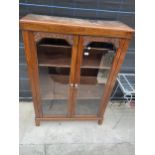 A VICTORIAN GLAZED TWO DOOR BOOKCASE, 39" WIDE
