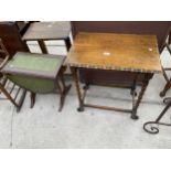 AN EARLY 20TH CENTURY OAK CENTRE TABLE ON BARLEYTWIST LEGS AND MINIATURE SOFA-TABLE