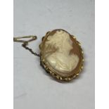 A CAMEO BROOCH WITH A 14 CARAT GOLD MOUNT