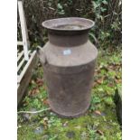 A VINTAGE 15 GALLON MILK CHURN (LACKING LID)