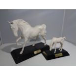 A BESWICK YOUNG SPIRIT AND A SPIRIT OF FREEDOM ON PLINTHS