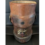A MILITARY LEATHER POWDER FLASK
