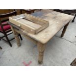 A VICTORIAN PINE KITCHEN TABLE ON TURNED LEGS, 53 X 36"