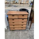 A MODERN WICKER CHEST OF TWO SHORT AND FOUR LONG DRAWERS, IN METALWARE FRAME, 30" WIDE