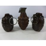 A WWII PINEAPPLE GRENADE AND TWO PRACTICE GRENADES