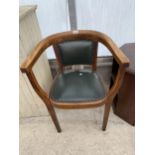 A MID 20TH CENTURY BEECH OFFICE ELBOW CHAIR