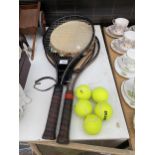 TWO TENNIS RACKETS, A TAMBERINE AND FIVE TENNIS BALLS