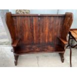 AN 18TH CENTURY STYLE ELM CURVED FRONT SETTLE WITH DOUBLE STEPPED BACK, 56" WIDE