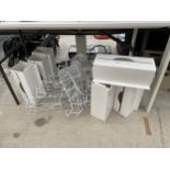 A LARGE QUANTITY OF METAL WALL MOUNTED STORAGE RACKS, HAND TOWEL DISPENERS AND A TWO TIER SHELVING