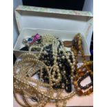 A QUANTITY OF COSTUME JEWELLERY