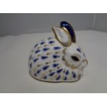 A ROYAL CROWN DERBY RABBIT WITH SILVER COLOURED STOPPER